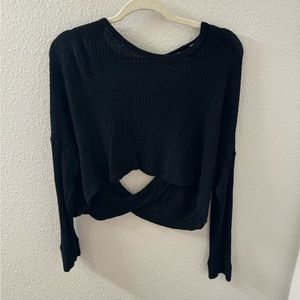 Black cropped sweater with open twist back